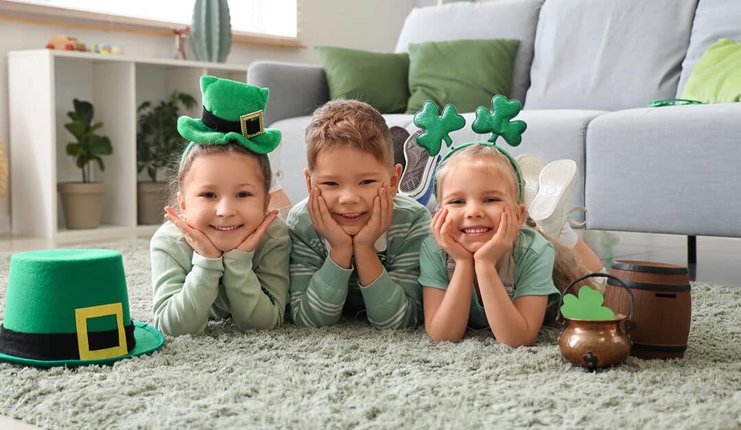 Cute kids celebrating St. Patrick's Day with festive green outfits at home party learning Spanish words and phrases to celebrate St. Patrick's Day