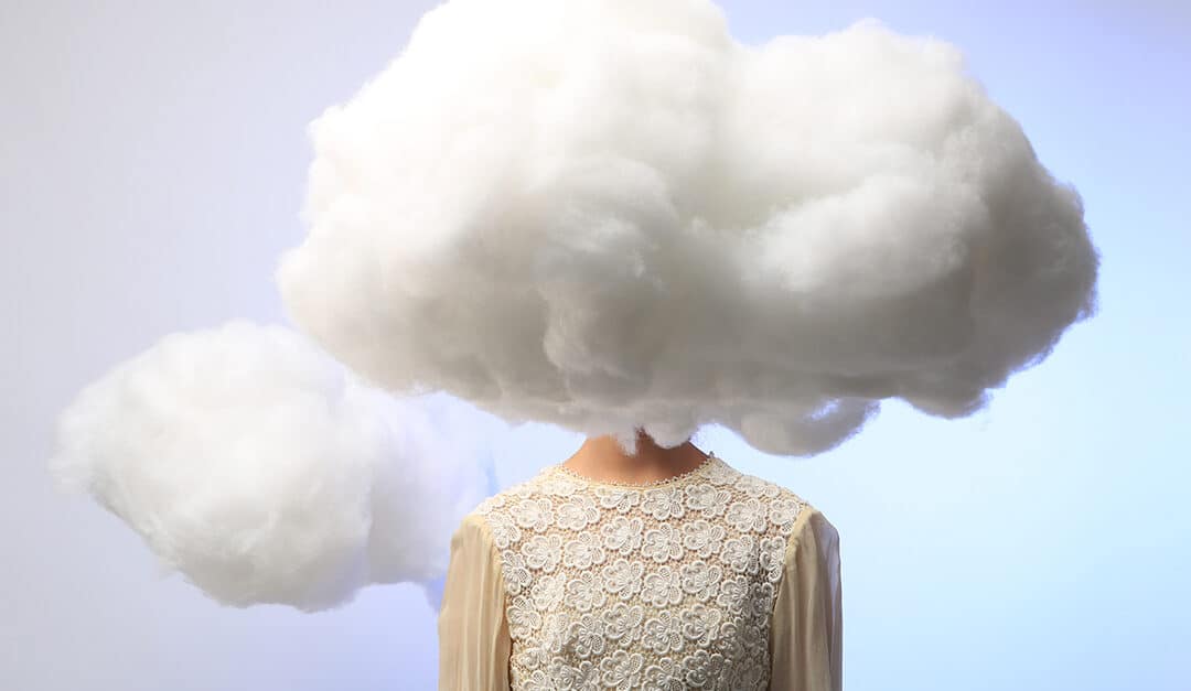 A young girl with her head in the clouds